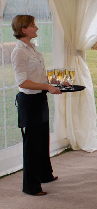 waitress serving champagne